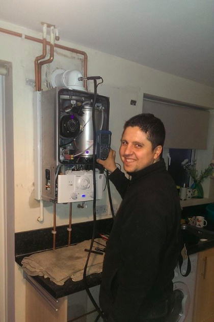 Yunus carrying out a boiler service